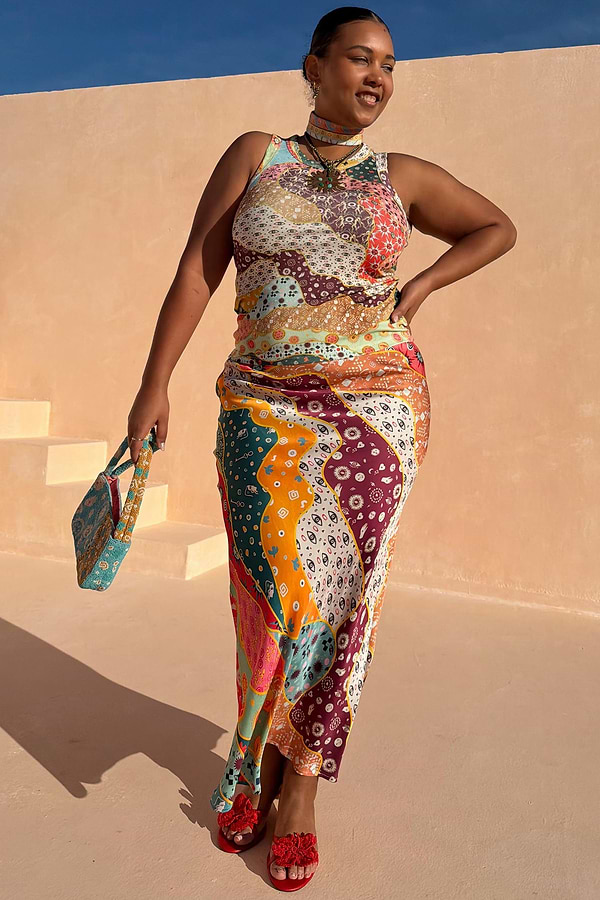 Pastel Morocco Dorris Skirt in a multi-colour abstract print with eye motifs, shown on a model for inclusive sizing.