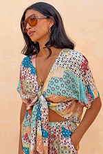 Morocco Tie Front Top in a celestial patchwork print with blue and rust tones, featuring an adjustable tie front.
