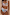 Thumbnail for Morocco High Waist Brief in a sun washed celestial patchwork print, styled with the matching bikini top.