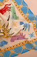 Celestial Bandana featuring hand-painted mystical hands and suns with a bold blue and yellow patterned border.