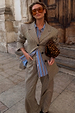 Grey Check Trousers and matching blazer styled with a blue striped shirt and leopard print clutch.