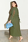 Khaki Celia Plisse Dress with sheer sleeves and ties, styled with leopard print heels and a blue clutch bag.