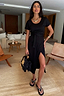 Thumbnail for Black Jesse Jersey Wrap Dress in soft cotton featuring a T-shirt bodice and adjustable wrap tie waist, shown on a model.