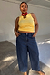 Lemon Ribbed Tank in yellow ribbed fabric, styled with dark wash wide-leg jeans and a red bandana.