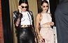 Iconic white Boob T-shirt worn by Kendall Jenner with black leather trousers and a sheer mesh jacket.