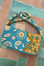 Thumbnail for Blue and Yellow Morocco Beaded bag featuring hand-embellished glass beads and iconic motifs on a tiled background.