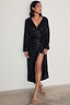 Black Sequin Kira Wrap Dress with long sleeves and an adjustable midi-length wrap fastening.