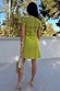 Lime Green Shell Mini Elodie Dress featuring a circular crochet knit top with shell details and a satin mini skirt.