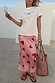Pink Hearts Dorris Skirt with red hearts and signature key-and-eye motifs in a relaxed midaxi fit.