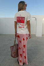 Pink Hearts Dorris Skirt with red heart prints and signature motifs, styled with a white graphic rodeo tee.