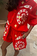 Red Snake Elissa Shorts and Miley shirt co-ord with checkered snake motifs and stars in a bright red tone.