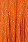 Orange jacquard fabric of the Bibi Dress with gold metallic woven details in a diamond-like formation.