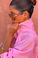 Pink Organza Funnel Jacket in semi-sheer fabric with a statement funnel collar, styled in a profile close-up.