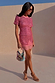 Pink Sequin T-Shirt with a relaxed fit, paired with a matching lace-trimmed sequin skirt and a beaded handbag.