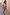 Thumbnail for Blue Poppy Mini Jaspre Skirt with an orange floral print and frill hem, styled with a light blue shirt.
