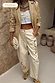 Ecru Raffia Palma Barrel Leg Jeans with intricate brown palm embroidery on cream denim, styled for a premium look.