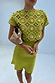 Green Shell Mini Elodie Dress featuring a lime crochet knit top with gold shell charms and a satin mini skirt.