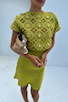 Green Shell Mini Elodie Dress featuring a lime crochet knit top with gold shell charms and a satin mini skirt.