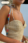 Premium beige Raffia Cecilia Top with corset structure and multicoloured beaded multi-wear straps.