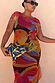 Rio Mesh Dress in a bold fruit print on stretch mesh with cap sleeves, showing vibrant colour blocks and inclusive sizing.