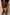 Thumbnail for Rio Mini Maeva Skirt in a tropical fruit print with brown lace trim, styled with a brown ribbed tank top.