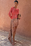 Thumbnail for Spliced Fawn Mini Nola Tie Dress featuring a red spotted top and brown animal print asymmetric skirt.
