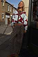 Burgundy & Blue Poppy Cardigan with leopard trim and blue poppy print, styled with leopard trousers for a London look.