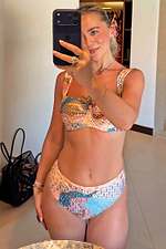 Morocco High Waist Brief with a celestial patchwork print, styled with a matching bikini top for a sun-washed vacation look.