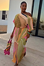 Green Abstract Tilly midaxi dress featuring metallic gold flecks and abstract print on a UK size 18 model.