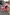 Thumbnail for Kids Red and Pink Bandana Knitted Set on a child walking with a model and a dog on a London street.