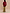 Thumbnail for Olive Mystical Dorris Skirt with a celestial print, styled with a red color-block cardigan from behind.