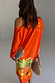 Thumbnail for Orange Rio Jem Dress in a relaxed off-shoulder fit with tropical fruit and star prints, viewed from the back.