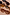 Thumbnail for Hexagon Orange Sunglasses with light-tinted lenses, styled among various animal print and studded eyewear frames.
