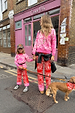 Kids Red and Pink Bandana Knitted Set styled on a young girl with a coordinated adult outfit on a London street.