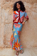 Petite Dolce Vita Dorris Skirt in a blue satin-feel bias cut with sun motifs and a matching Hollie cardigan.