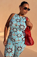 Blue Sun Tank Top in a bright blue colourway with sun motifs, styled as a co-ord with matching trousers.