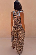 Leopard Balloon Trousers and matching tank top, styled from the back for a vacation-ready look.
