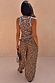 Leopard Balloon Trousers and matching tank top, styled from the back for a vacation-ready look.