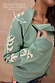 Sage Sundazed Accessible Sweatshirt with cream palm print and a concealed chest zip for treatment access.