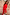 Thumbnail for Red Celestial Cardigan in a soft knit with embroidered sun and palm motifs, paired with a matching skirt.