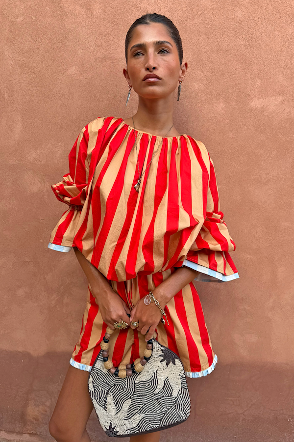 Red and camel Tomato Stripe Blouse with voluminous flared sleeves and matching shorts co-ord.