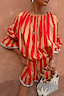 Tomato Stripe Blouse in red and camel stripes with voluminous sleeves and gathered neckline, styled as a vacation co-ord.