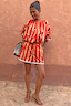 Red and camel striped cotton Tomato Stripe Blouse with voluminous sleeves and matching co-ord shorts.