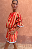 Tomato Stripe Ellie Shorts and matching co-ord blouse in red and camel stripes with blue contrast trims.
