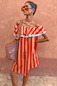 Thumbnail for Tomato Stripe Mini Dress in red and camel stripes with a multi-wear ruffle neckline and beach bag.