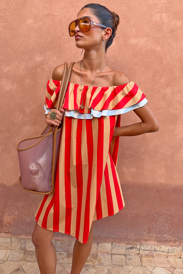 Tomato Stripe Mini Dress in red and camel stripes with a multi-wear ruffle neckline and beach bag.