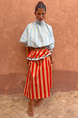 Tomato Stripe multi-wear dress styled as a red and camel maxi skirt with a blue striped high-neck scarf top.