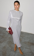 model is wearing our silver plisse sophia dress with a burgundy clutch bag 