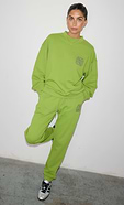 model is wearing the olive and charcoal tracksuit