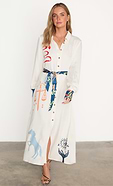 model is wearing the mystical print shirt dress